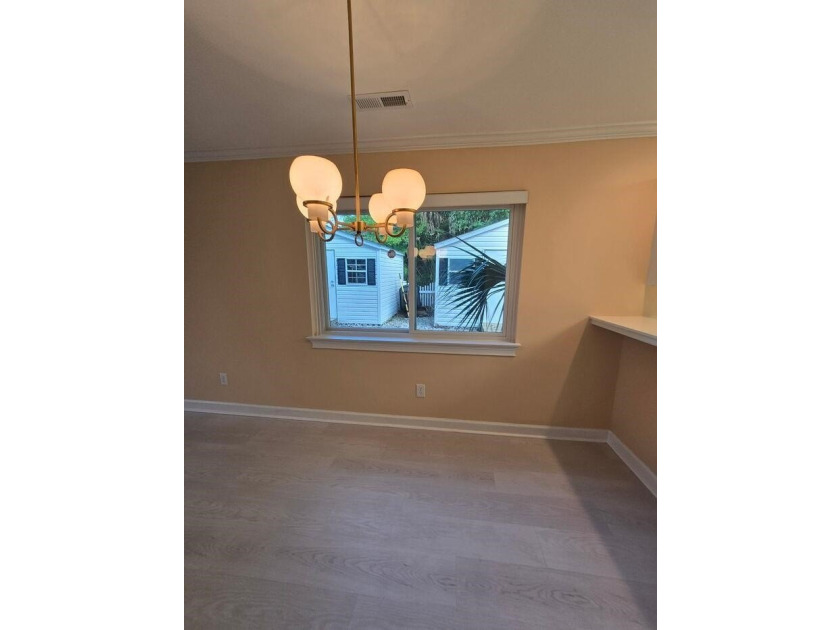 Beautifully maintained 3-bedroom, 2-bath corner-unit townhome in - photo 6