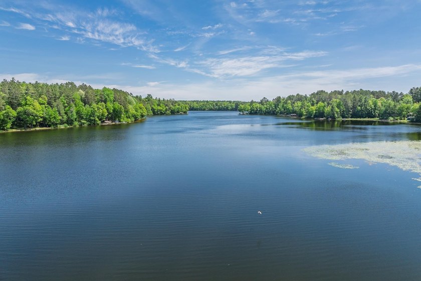 Welcome to this spacious Northwoods waterfront retreat on - photo 3