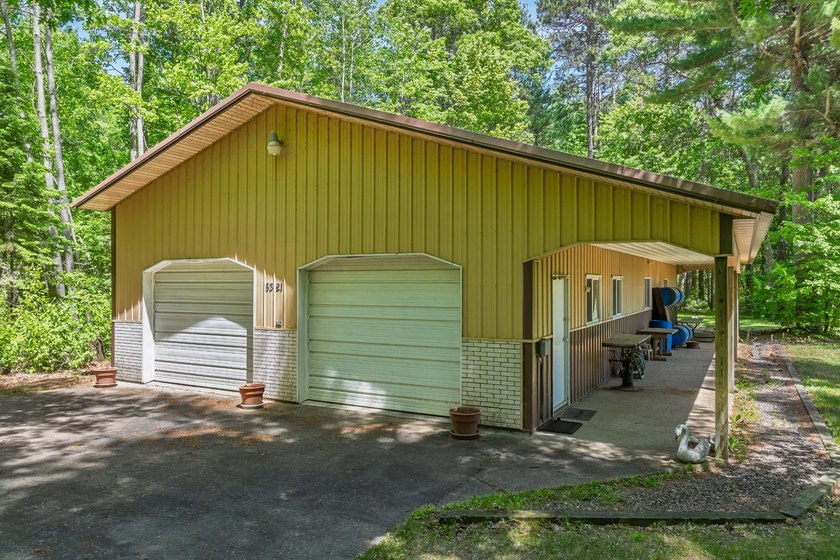 Welcome to this spacious Northwoods waterfront retreat on - photo 4