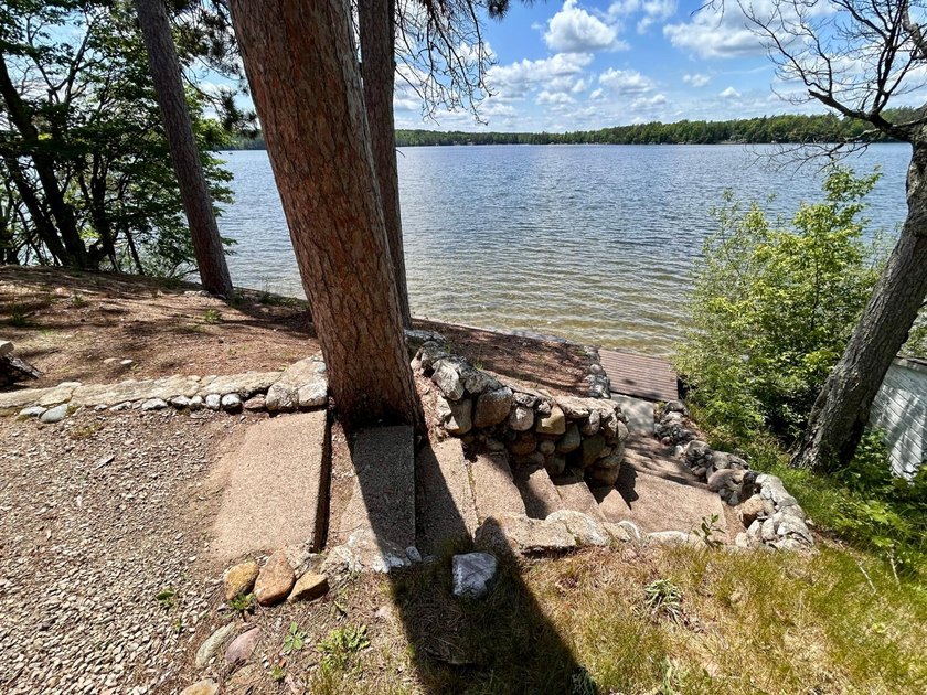 GORGEOUS LAKE HOME WITH PREMIER SANDY FRONTAGE ON - photo 4