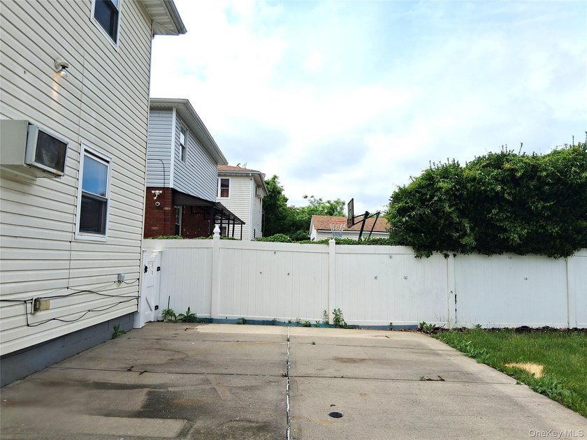 Welcome to this spacious two-family home nestled in the heart of - photo 14