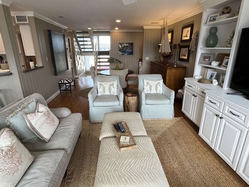 Discover the epitome of coastal elegance at 103 Inlet Point - photo 2