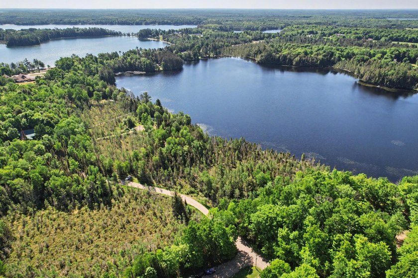 Peaceful Mill Lake Waterfront Lot - 2.24 Acres in Sugar Camp! - photo 8