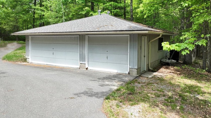 Experience waterfront living on Long Lake, part of the renowned - photo 4