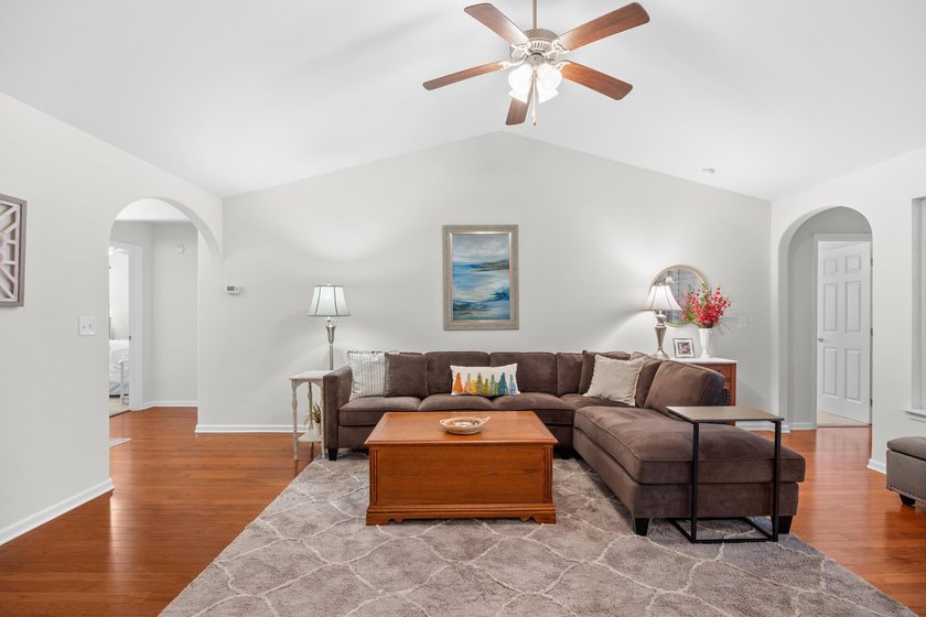 This 3 bed/2 bath charming coastal cottage is nestled within The - photo 5