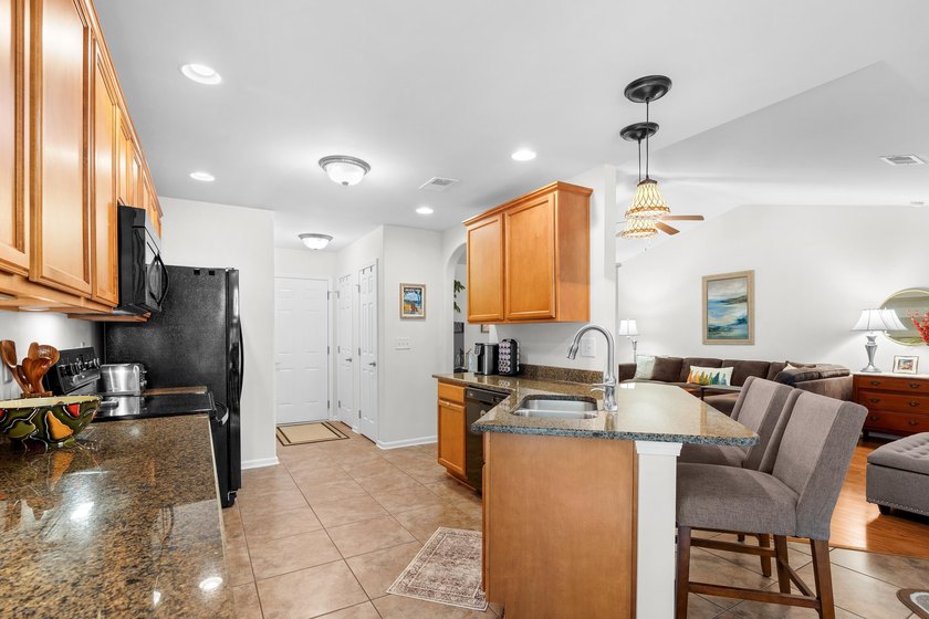 This 3 bed/2 bath charming coastal cottage is nestled within The - photo 10