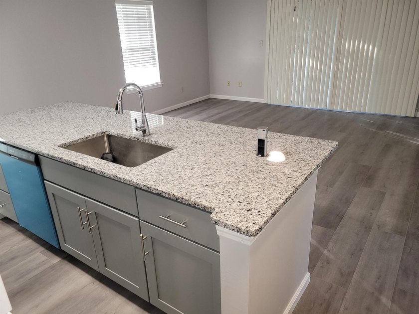 Welcome to this beautifully remodeled first floor 2-bed 2-bath - photo 7