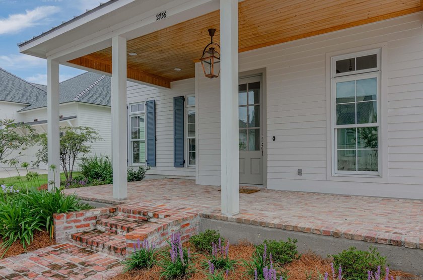 Picture brick sidewalks, front porch swings, and neighbors who - photo 21