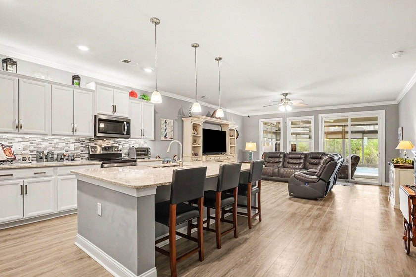 Welcome to this exceptional 6-bedroom, 3.5-bath home nestled on - photo 9