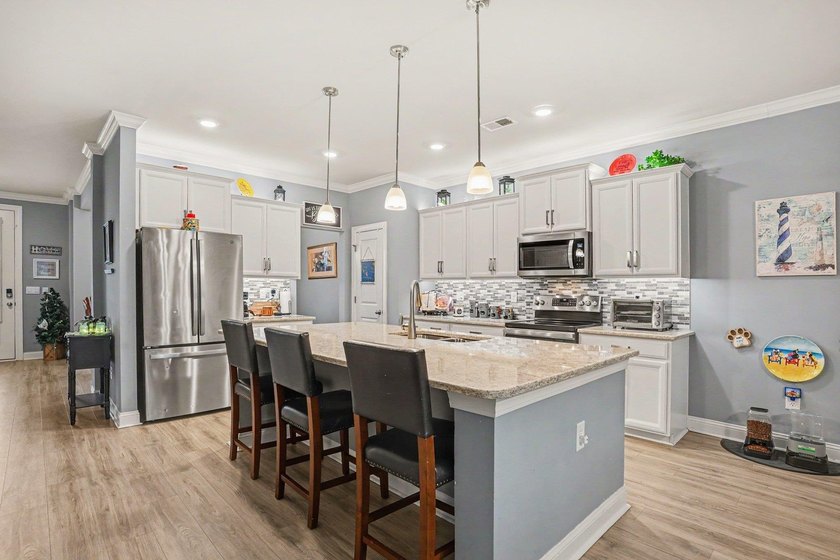 Welcome to this exceptional 6-bedroom, 3.5-bath home nestled on - photo 10