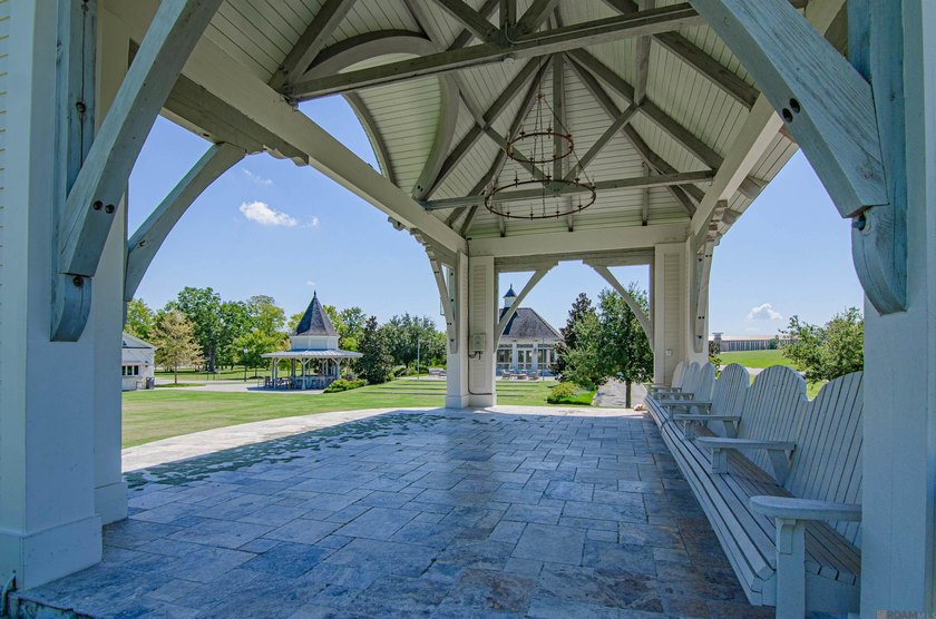 Picture brick sidewalks, front porch swings, and neighbors who - photo 37