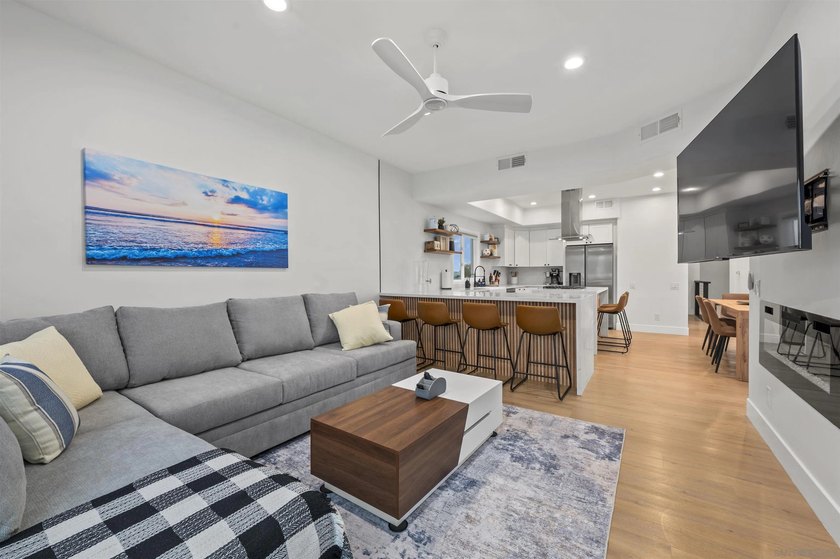 Beautifully renovated 3bed/3bath townhome located steps from the - photo 3