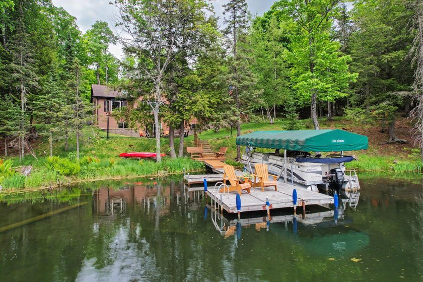 Tucked away in Watersmeet, MI, just north of the border, you'll - photo 4