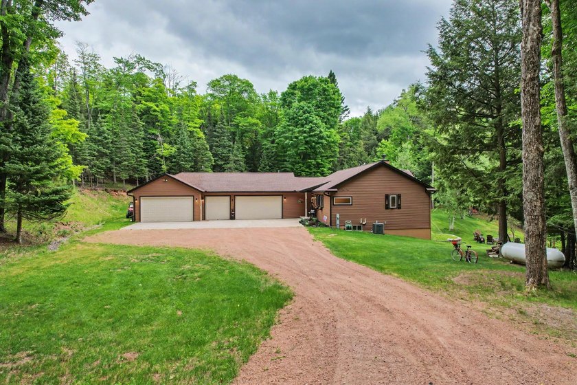 Tucked away in Watersmeet, MI, just north of the border, you'll - photo 5