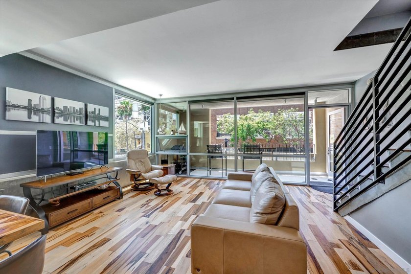 STUNNING SOUTHWEST CORNER TOWNHOME LOCATED IN ONE OF THE MOST - photo 3