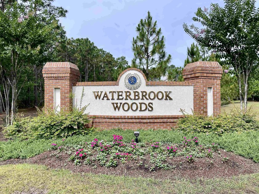Spacious homesite located in the Waterbrook Woods section of - photo 9