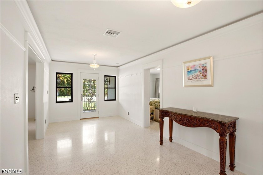 This 3-bedroom, 2-bathroom ranch-style home is set on an - photo 3