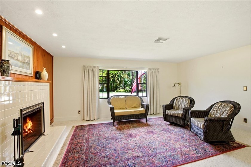 This 3-bedroom, 2-bathroom ranch-style home is set on an - photo 7
