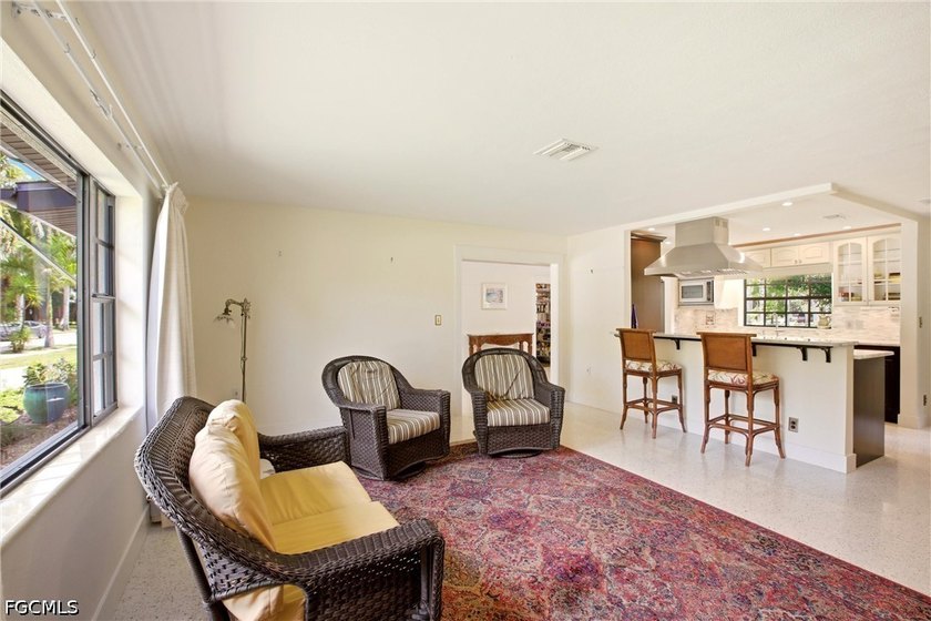 This 3-bedroom, 2-bathroom ranch-style home is set on an - photo 8