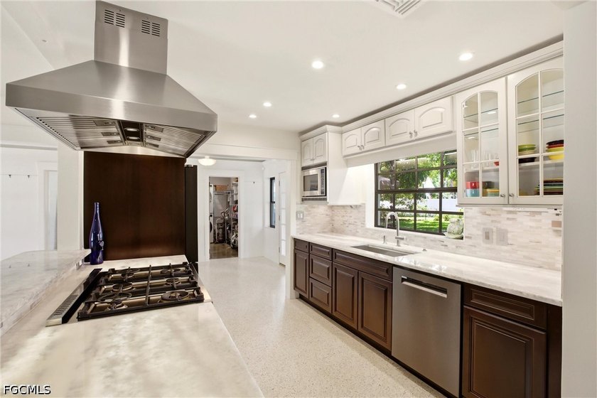 This 3-bedroom, 2-bathroom ranch-style home is set on an - photo 9