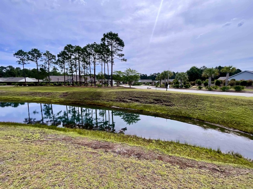 Spacious homesite located in the Waterbrook Woods section of - photo 2