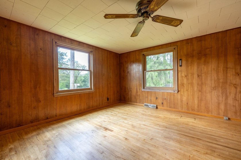 Set on nearly 25 acres along the scenic Deerskin River in Phelps - photo 6