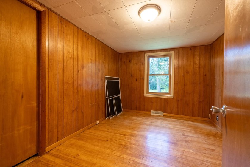 Set on nearly 25 acres along the scenic Deerskin River in Phelps - photo 9