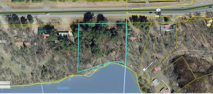 This 1.3-acre wooded lot offers 258 feet of pristine lakeshore - photo 13