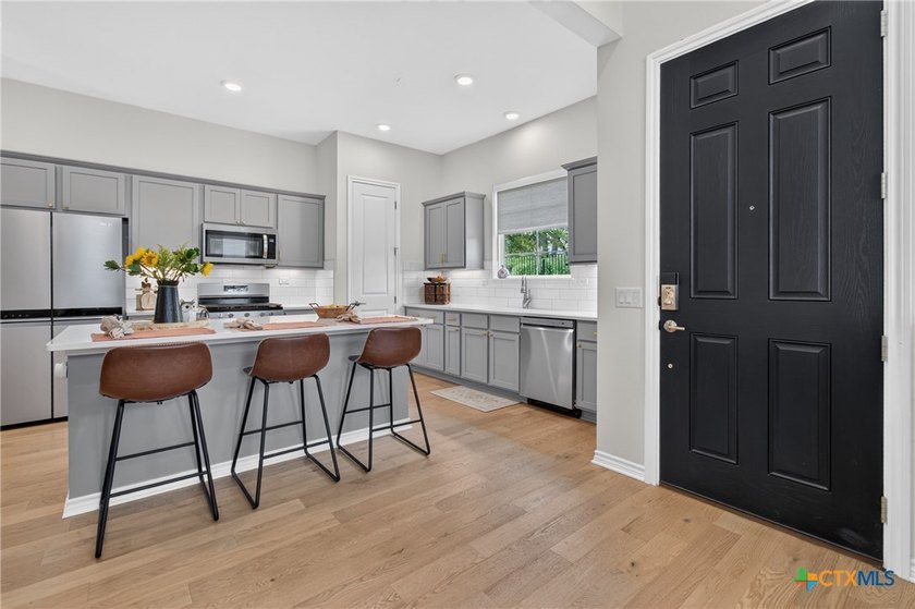 Welcome home to your own slice of paradise in the highly - photo 3