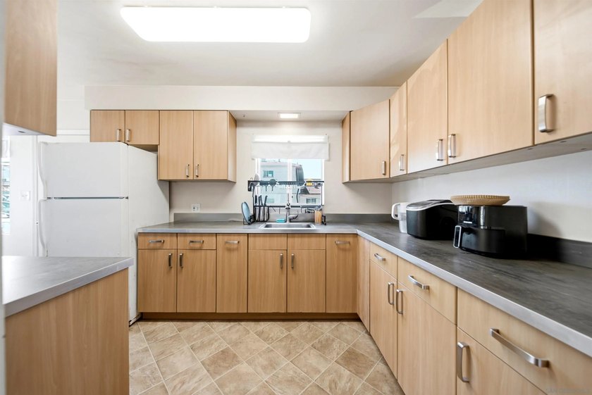 A rare Ocean Beach opportunity that works three ways: move in - photo 8