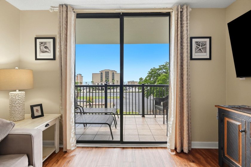 Welcome to Holiday Tower, where coastal convenience and a - photo 4