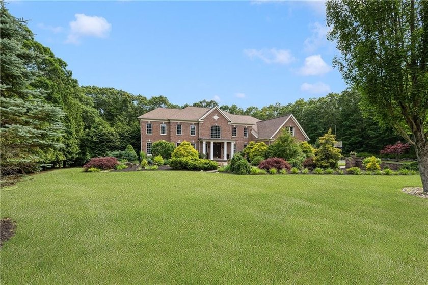 Welcome to 50 Judge Torres Lane, located in the prestigious - photo 2