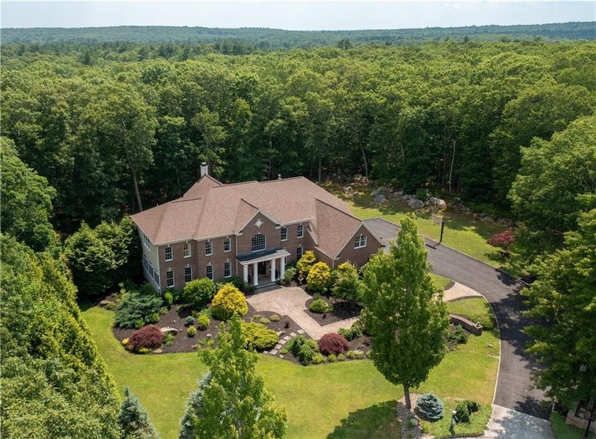 Welcome to 50 Judge Torres Lane, located in the prestigious - photo 3