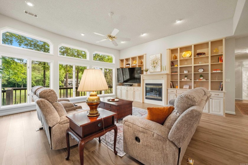 Wake up to sweeping golf course views from this beautifully - photo 3