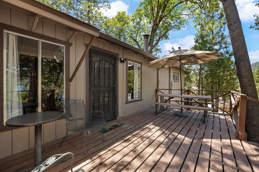 Opportunity awaits! This classic Bass Lake cabin offers the - photo 49
