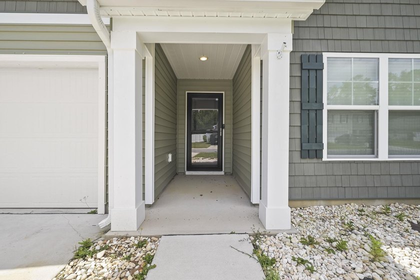 Welcome to 187 Seasons Trace Loop, a charming home located in - photo 4