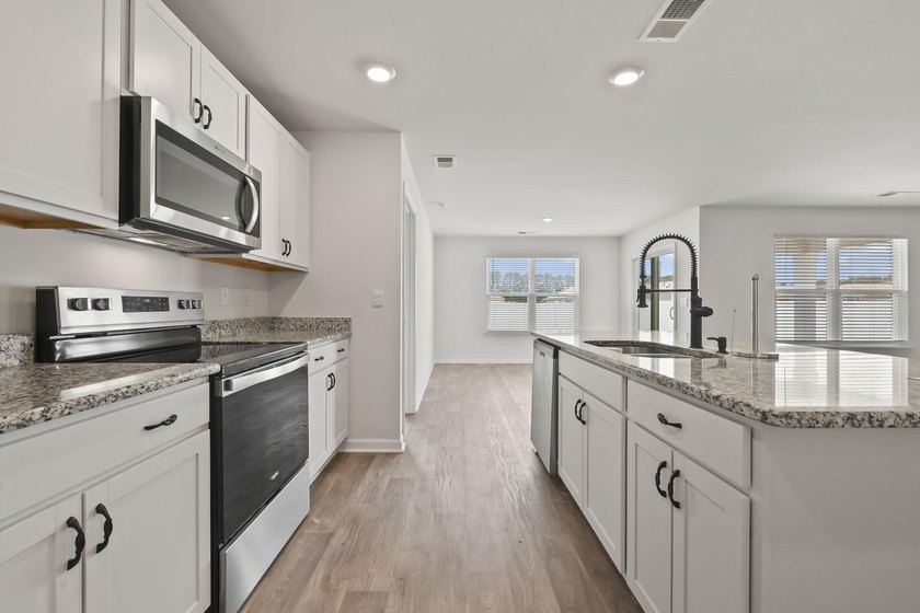 Welcome to 187 Seasons Trace Loop, a charming home located in - photo 9