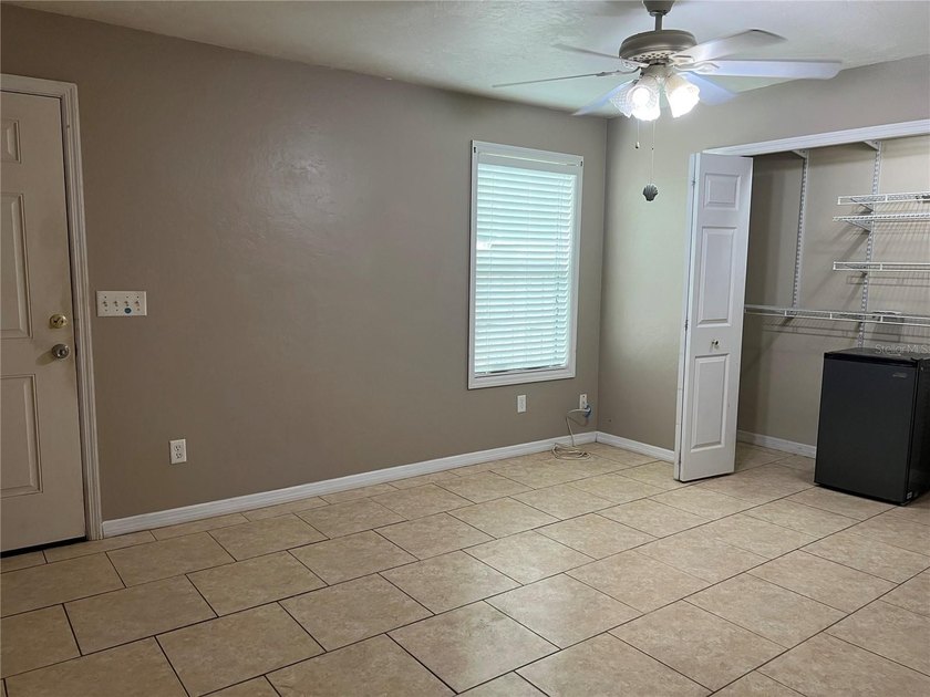 Welcome home to this charming 4-bedroom, 2-bath concrete block - photo 12