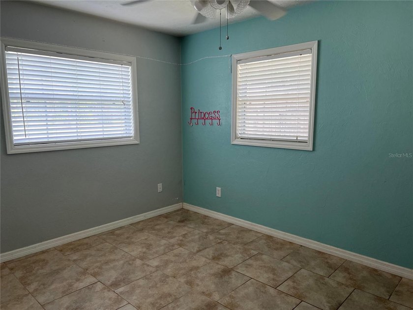 Welcome home to this charming 4-bedroom, 2-bath concrete block - photo 17