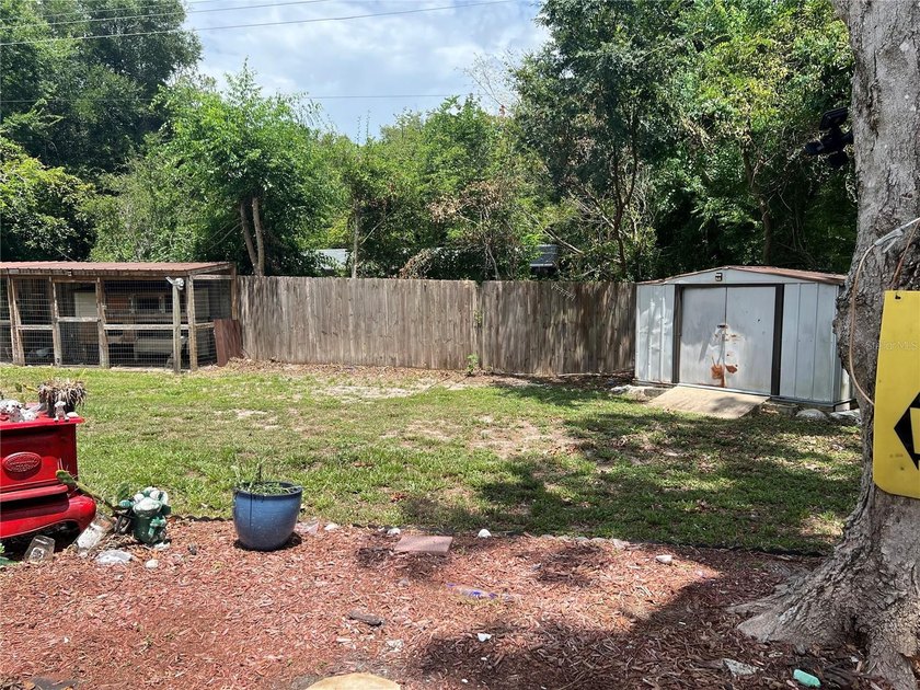 Welcome home to this charming 4-bedroom, 2-bath concrete block - photo 23
