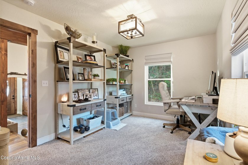 Welcome to your mountain escape in scenic Sagle, Idaho! This - photo 32