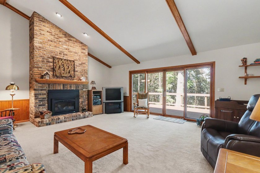 Nestled among towering Northwoods pines on 1.5+ acres, this - photo 9