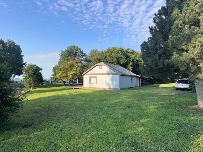 Nestled on a generously sized lot in a quiet area of Johnson Lake - photo 2