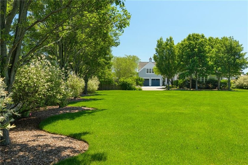 Nestled within the private gates of Carnegie Harbor, one of - photo 6