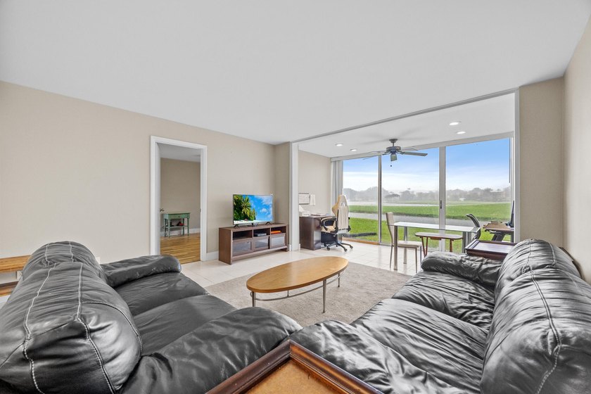 Wake up to tranquil lake and golf course views in this - photo 14