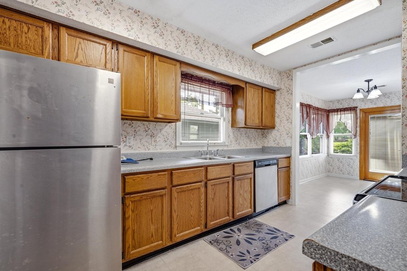 Opportunity awaits in the highly desirable 55+ community of - photo 5