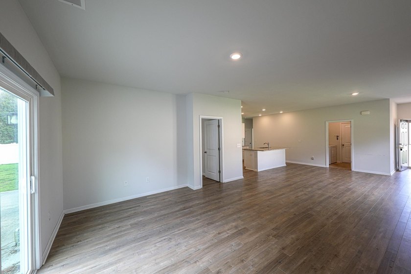 Welcome to this 4-bedroom, 2-bath home with a 2-car garage - photo 3