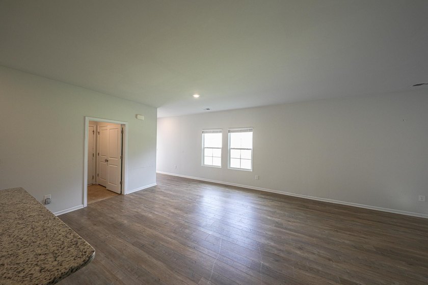 Welcome to this 4-bedroom, 2-bath home with a 2-car garage - photo 4