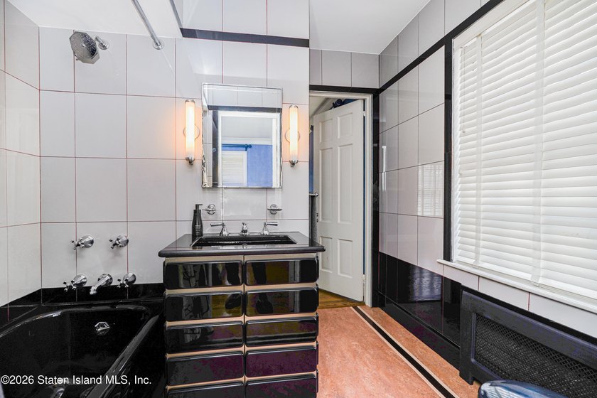 Nestled in prestigious Grymes Hill, this timeless residence is - photo 23