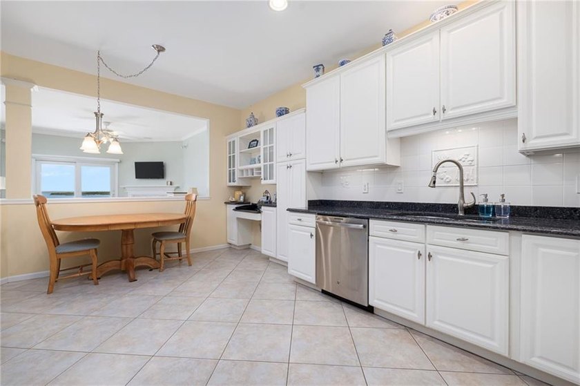 We invite you to explore this expansive end-unit - photo 4